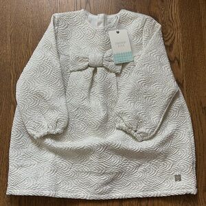 Gorgeous cream bow dress